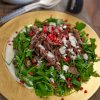 Shredded beef and rocket salad with tahini yoghurt dressing