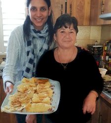 Greek traditional Diples dipped in honey syrup - Δίπλες