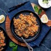 Spanakorizo with tomatoes (spinach rice)