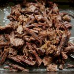 Slow cooked shredded beef sauce